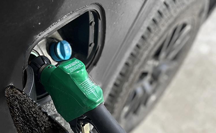 Diesel pump nozzle in a fuel tank