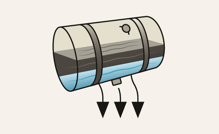 Fuel tank showing water being removed from diesel fuel.
