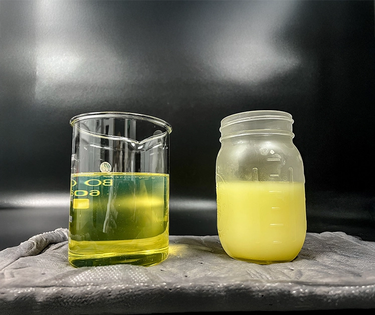 Two beakers of diesel fuel; one a liquid at room temperature, the other gelled after being in the freezer.