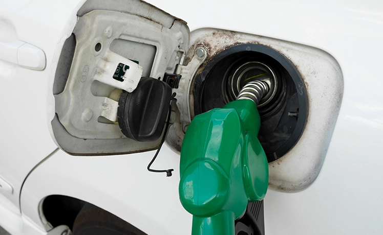 A fuel tank with a diesel pump refueling.